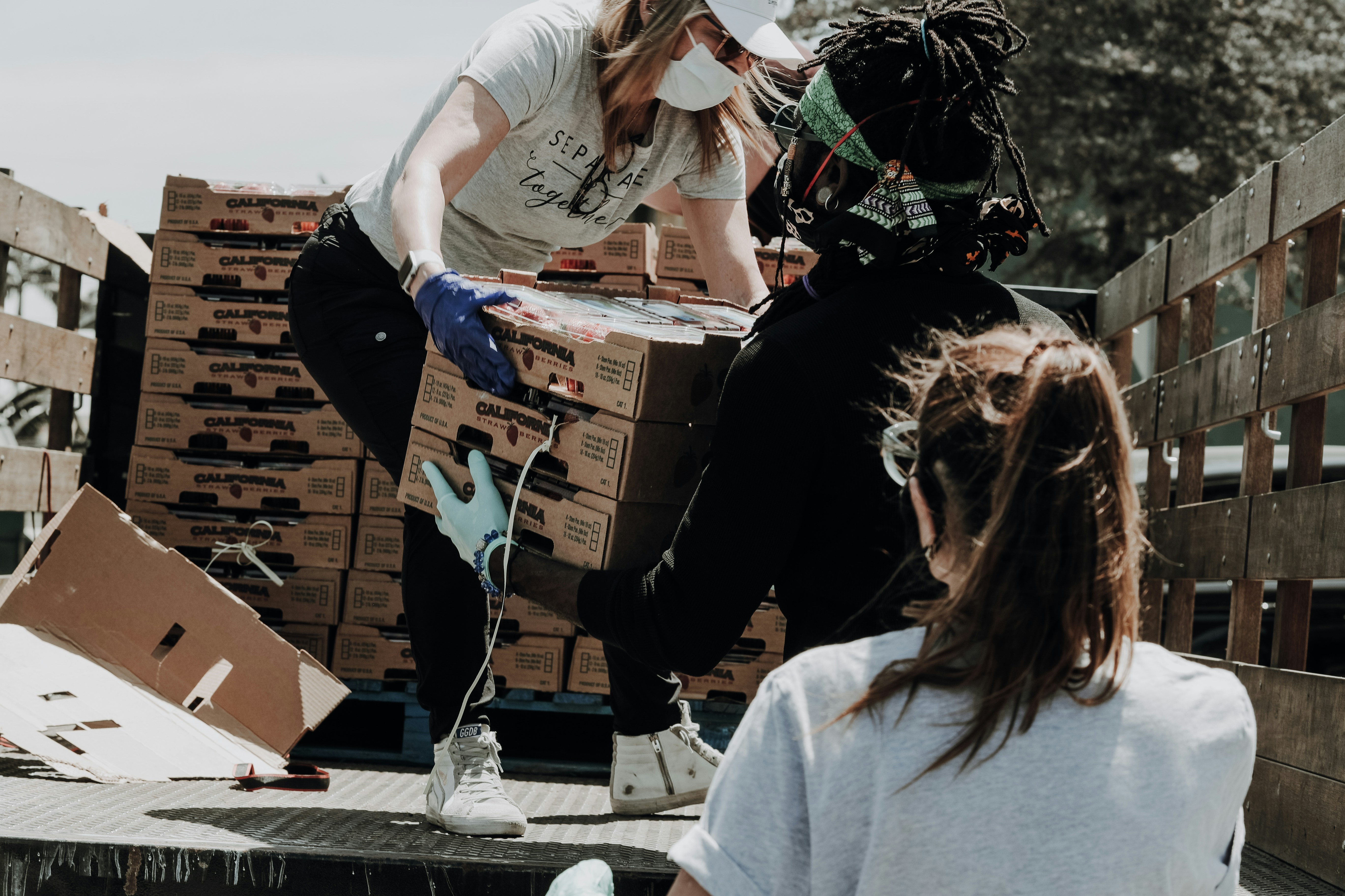 Volunteers working together on a community donation drive